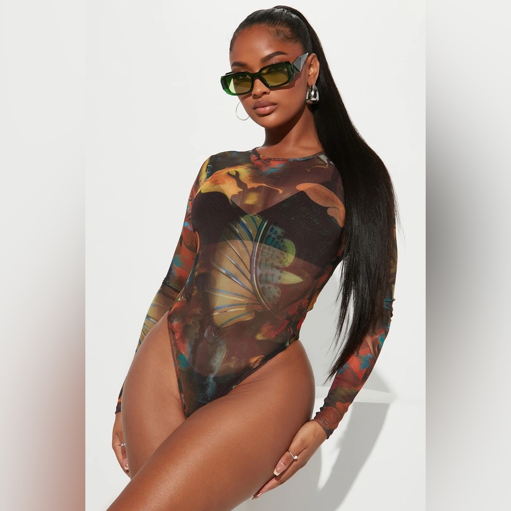 New with tags, Never Worn
Fashion Nova Give me Butterflies Mesh Bodysuit
Size 1x